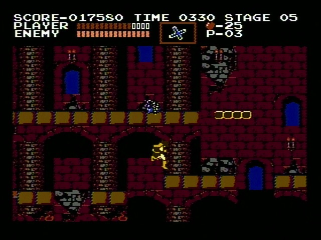 Castlevania. There is a status bar at the top of the screen, and Simon is being knocked into a pit by a medusa head