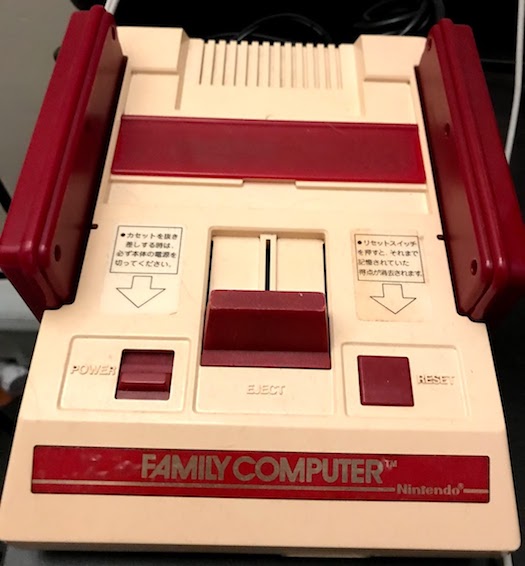 A Nintendo Famicom, somewhat yellowed