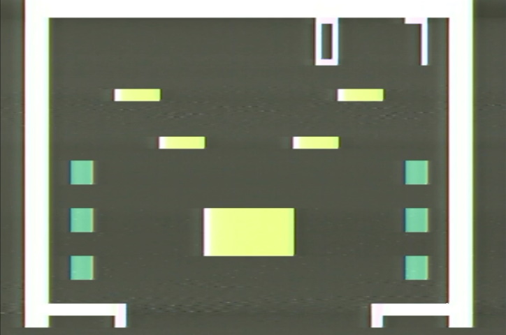 The gamefield of Pinball-I. The table is vertically oriented, with the gap at the bottom being quite large, and rectangular colored targets throuhgout