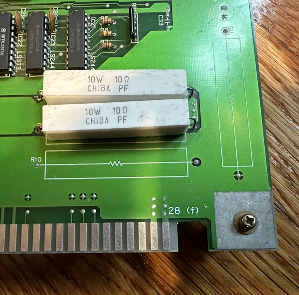 Two large white 10-ohm power resistors on the PCB.